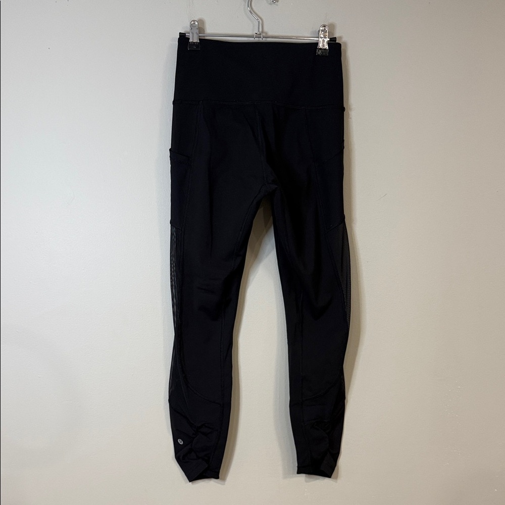 Lululemon solid black leggings with ankle dot and ruching + mesh pockets